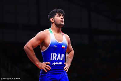  محمدامین حسینی مدال خود را به شهدای جنگ رمضان اهداء کرد+ عکس