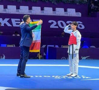  سلام نظامی پسر طلایی تکواندو به پرچم ایران