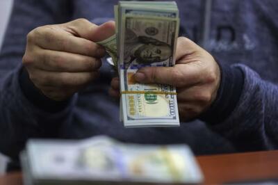  وال استریت ژورنال: دولت ترامپ مانع از ورود دلار به عراق می‌شود