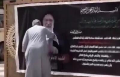  ادای احترام مرد عراقی در کربلا به رهبر شهید ایران
