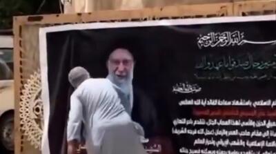  ادای احترام مرد عراقی در کربلا به رهبر شهید انقلاب