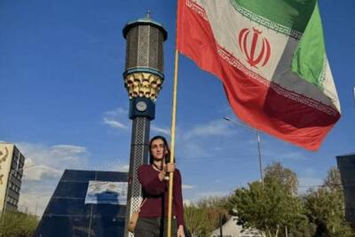  پرچمی که تاریخ را لمس کرد: لحظه‌ای از ایستادگی ملت