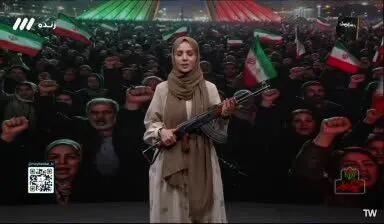  مجری زن تلویزیون با اسلحه کلاشینکف روی آنتن زنده رفت + ویدئو