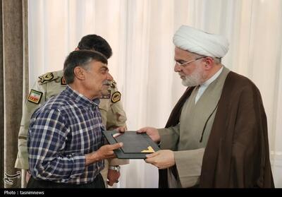  قدردانی از خانواده شهدای مرزبانی در سنندج تصاویر - تسنیم