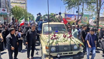  نمایی از آرامگاه ابدی شهید والامقام «امیرطا‌ها محمدی» در کنار شهدای ماهدشت