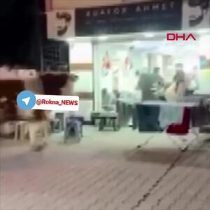  فیلم حمله گاو به آرایشگاه مردانه و فرار وحشت‌زده مشتریان