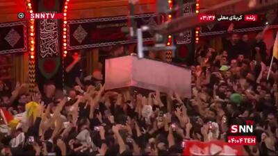  پیکر مطهر رهبر شهید پس از ورود به حرم حضرت ابالفضل العباس (ع) گلباران شد