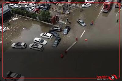  سرگردانی خودروها در سیل ویرانگر شمال شرقی چین