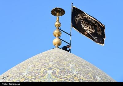  برافراشته شدن پرچم عزای حسینی در شلمچه - تسنیم