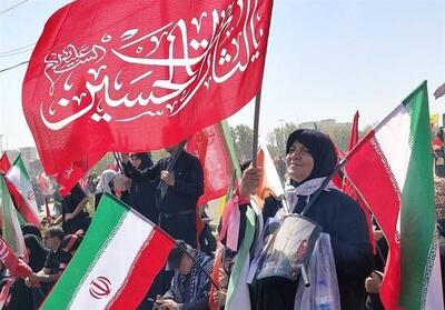  زنی پرصلابت با پرچم ایران؛ زنی شبیه ایران بود - تسنیم