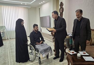  تجدید میثاق دفتر نظارت انتخابات کرمانشاه با خانواده شهدا تصاویر - تسنیم