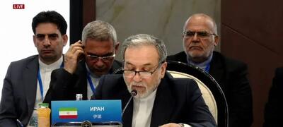  حرکت غیرمنتظره عراقچی در پایان اجلاس شانگهای + ویدئو