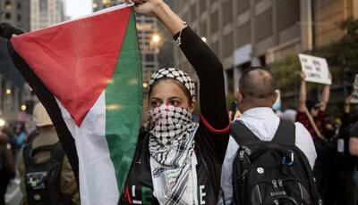 اهتزاز پرچن فلسطین در خیابان های واشنگتن همزمان با عبور نتانیاهو