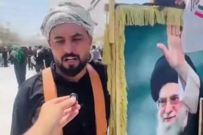 تصویر قائد شهید امت در دست زائر عراقی در بینالحرمین