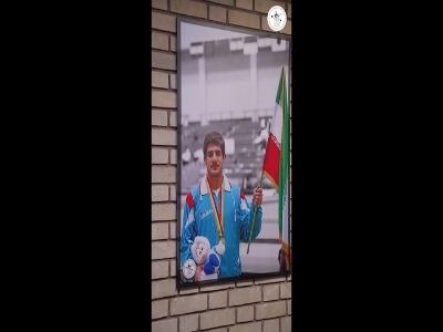  نصب تصاویر خانواده خادم در کمپ فدراسیون کشتی