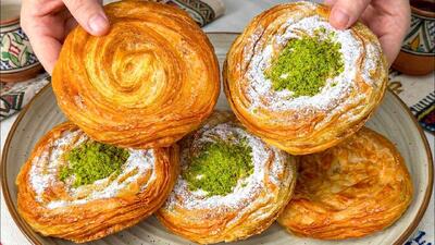  طرز تهیه قتلمه افغانی اصل؛ شیرینی لایه ای ترد و خوشمزه با پسته و کره