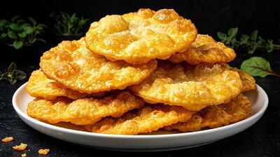 طرز تهیه نان فطیر (پفک) با آب پرتقال؛ یک شیرینی ساده و خوشمزه در ۵ دقیقه!