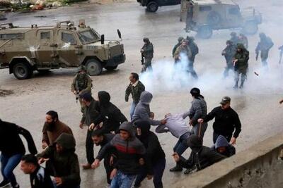  مجروح شدن 51 فلسطینی در یورش نظامی اسرائیل به اردوگاه قلندیا - تسنیم