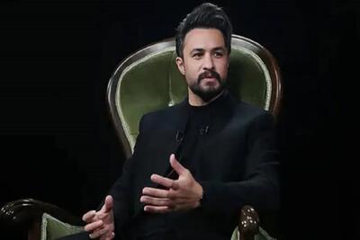  تجلیل رئیس‌جمهور از مصطفی راغب