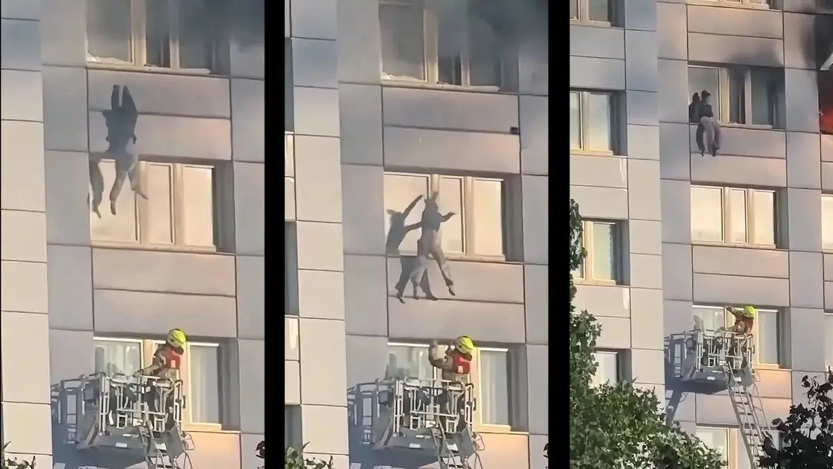 فیلم لحظه پرش زن وحشت زده از طبقه یازدهم در آتشسوزی / نجات معجزه آسا جلوی چشمان مردم