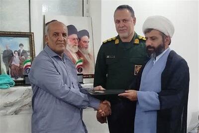 تجلیل از پاسدار پیشکسوت و آزاده دفاع مقدس در دلوار تنگستان - تسنیم
