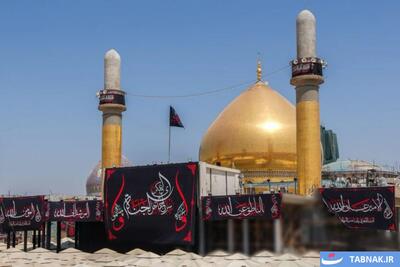 عکس: نصب کتیبههای شهادت امام حسن عسکری (ع) در حرمین سامرا