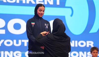 کُری خوانی دختر نوجوان برای قهرمان وزنهبرداری جهان | آخرین خبر