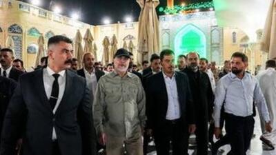  تیپ خاص قالیباف هنگام زیارت حرمین کاظمین/ هدیه خاص به رئیس مجلس+ تصاویر