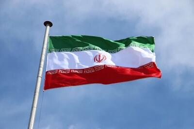  پرچم ایران از مشهد به دوش کشیده می شود تا در ناگویا به اهتزاز درآید