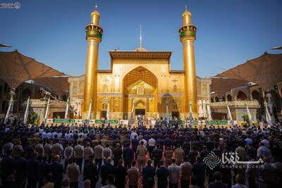  گزارش تصویری: برافراشتن پرچم میلاد پیامبر اکرم(ص) در حرم مطهر علوی