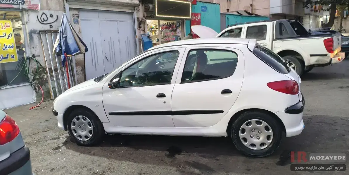  آخرین مهلت نام نویسی مزایده 550/000/000 تومانی پژو  206 TU5 رنگ : سفید مدل : 99