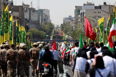  حضور عروس و داماد با لباس عروسی در مراسم جان‌فدایان