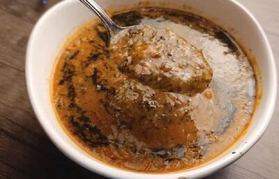 طرز تهیه آش گوجه فرنگی خوشمزه با بلغور و لوبیا چیتی؛ یک آش مقوی برای روزهای سرد
