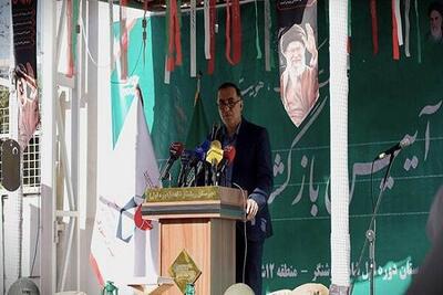  نواخته شدن زنگ ایثار توسط رئیس بنیاد شهید و امور ایثارگران