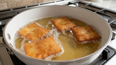  طرز تهیه گوش فیل خانگی ترد و پفکی با شربت زعفران