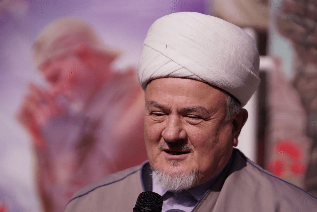 عکس/ حضور زائران روسی بر سر مزار حاج‌قاسم