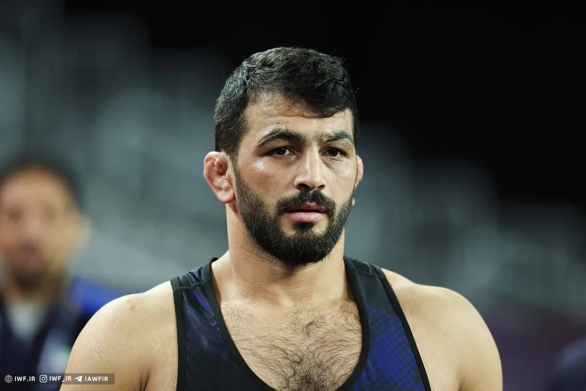 علت غیبت حسن یزدانی در اردوی تیم ملی کشتی چیست؟