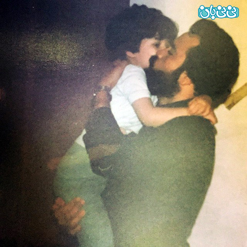 عکس مهراوه شریفی نیا، کودکی در آغوش پدرش