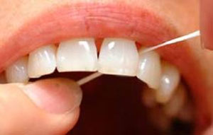 نحوۀ استفاده از نخ دندان