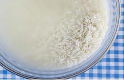 کاهش خطر آرسنیک با خیساندن و آبکش کردن برنج